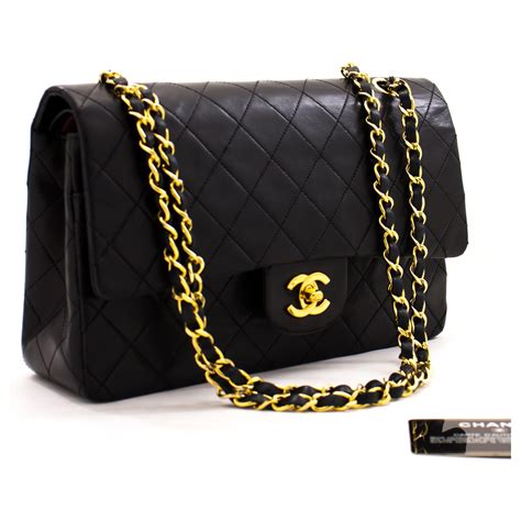 chanel flap bag black|Black Chanel leather shoulder bag.